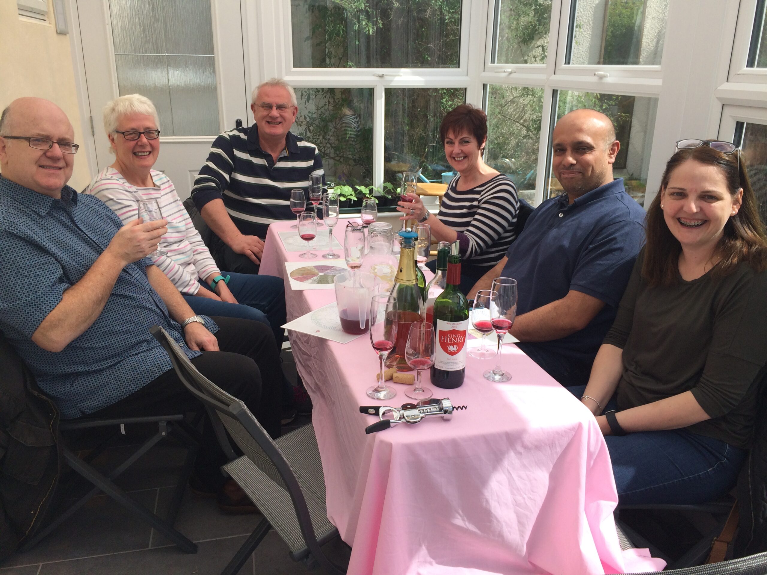 Guests enjoy a glass of wine in the Rothley Wine tasting room